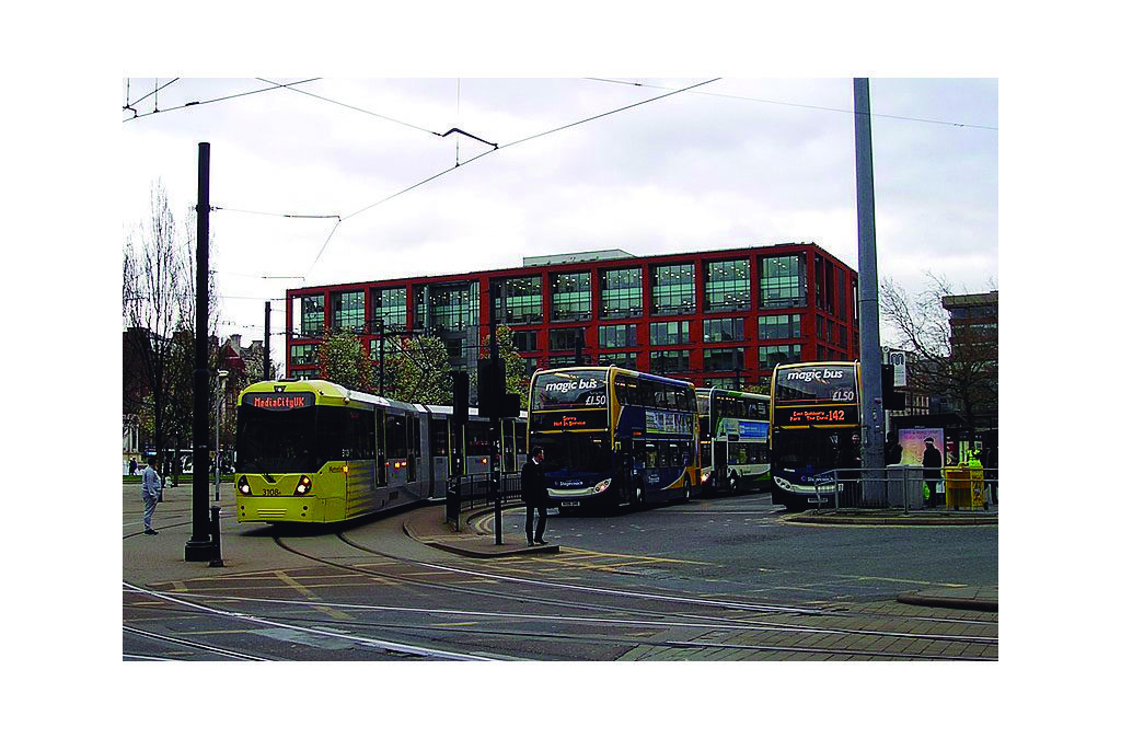 Electric coaches and buses. Piccadilly gardens in Manchester. It is a hotspot in public transport. several buses lines and trams joint there. Published at The Gren Bee: Eco-Journalism. Author Juanele Villanueva