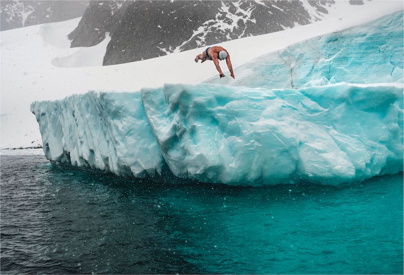 Lewis Pugh has swum in the seven seas to declare emergency in the oceans. He has done long-swims in ecosystems vulnerable to the climate crisis. He swam in the north pole with water minus 1.7 degrees. 